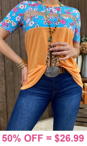 Orange top with blue floral and sequin stripe