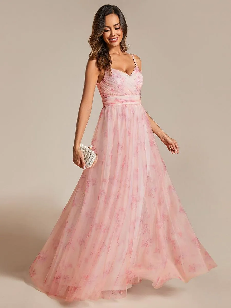 Robe de soirée florale à bretelles spaghetti et taille empire avec col en V