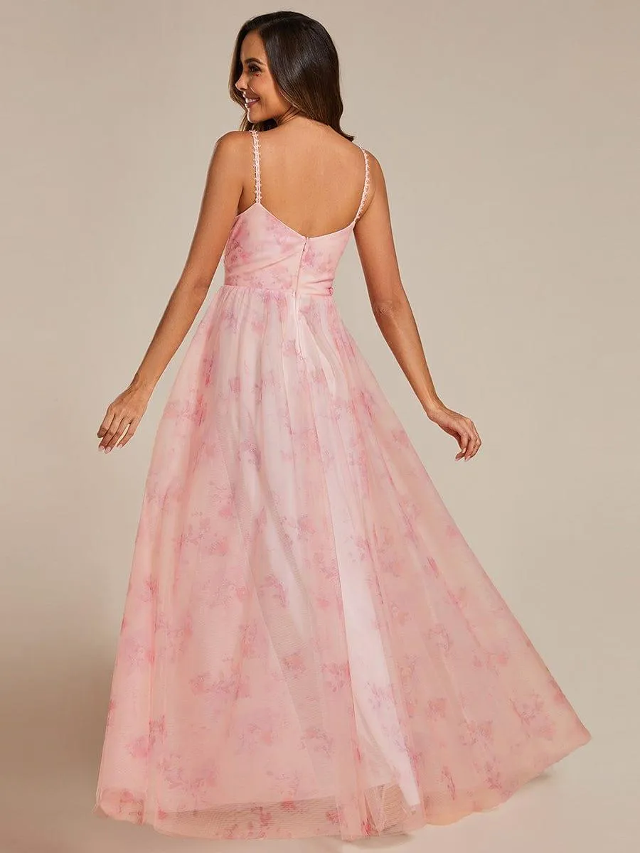 Robe de soirée florale à bretelles spaghetti et taille empire avec col en V