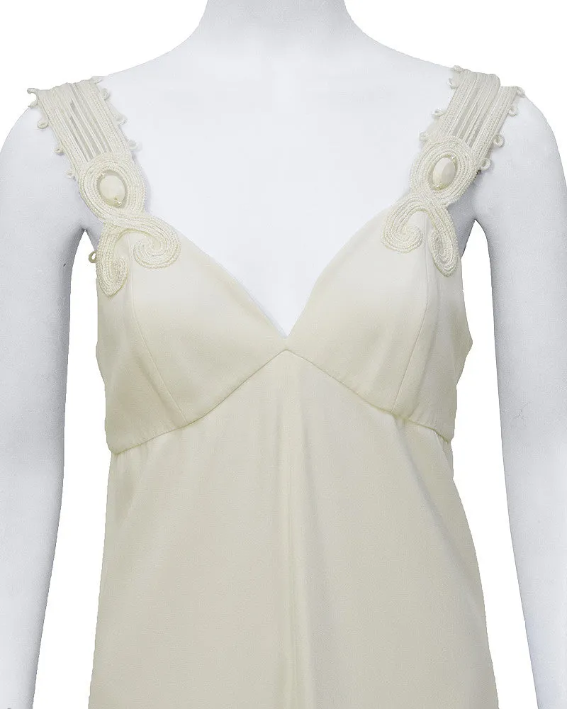 White gown with cord and stone applique