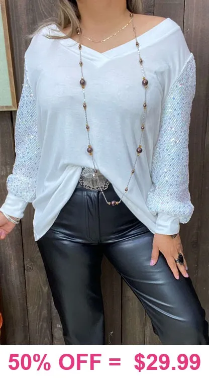 White top with sequin sleeves